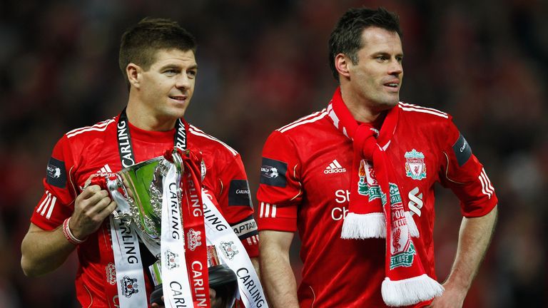 LONDON, ENGLAND - FEBRUARY 26:  Steven Gerrard and Jamie Carragher of Liverpool celebrate with the trophy after victory in the Carling Cup Final match betw