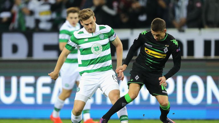 Stuart Armstrong tussles with Thorgan Hazard during Celtic's Champions League match with Borussia Monchengladbach