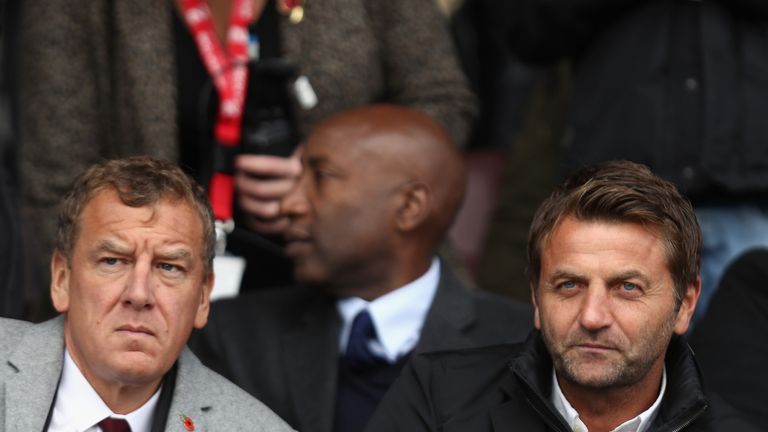 Swindon Town Chairman Lee Power (l) and Director of Football Tim Sherwood (r) look on