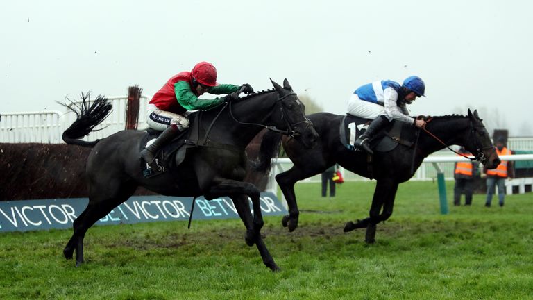 Taquin Du Seuil (left) ridden by Aidan Coleman wins the BetVictor Gold Cup Handicap Chase with third-placed Aso also pictured.