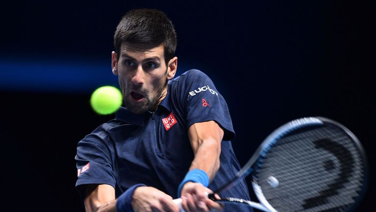 Serbia's Novak Djokovic returns against Britain's Andy Murray during the men's singles final on the eighth and final day