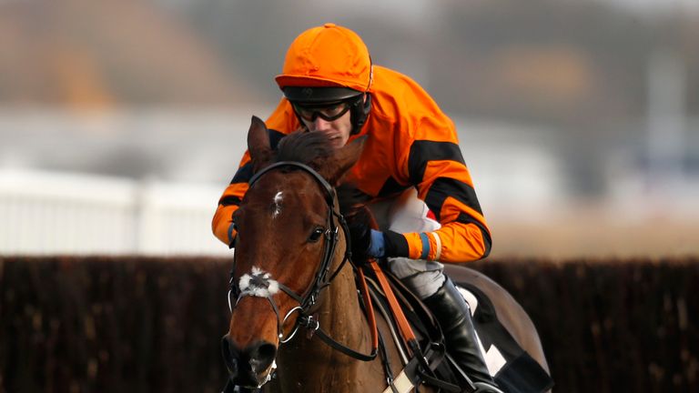 Tom Scudamore riding Thistlecrack clear the last to win The bet365 Novices' Steeple Chase at Newbury Racecourse.