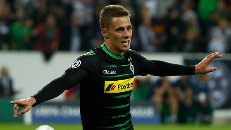 Thorgan Hazard celebrates after scoring in the Champions League