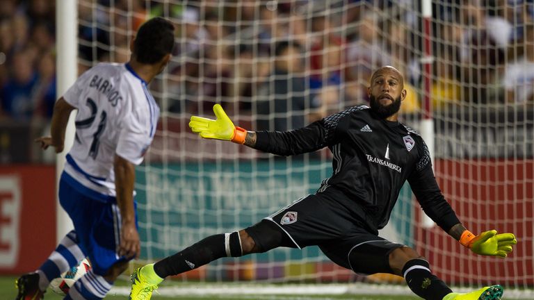 COMMERCE CITY, CO - JULY 23: Tim Howard #1 of the Colorado Rapids makes an unlikely save against a direct shot by Michael Barrios #21 of FC Dallas in the s