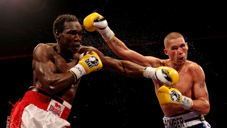 LIVERPOOL, ENGLAND - JULY 16:  Tony Bellew (R) connects with Ovill McKenzie during the Commonwealth And Vacant British Light-Heavyweight Championship bout 