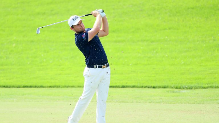 DUBAI, UNITED ARAB EMIRATES - NOVEMBER 20:  Tyrrell Hatton of England hits his second shot on the 3rd hole during day four of the DP World Tour Championshi