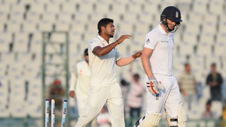 Umesh Yadav celebrates after bowling Chris Woakes on day one in Mohali (Credit: AFP)