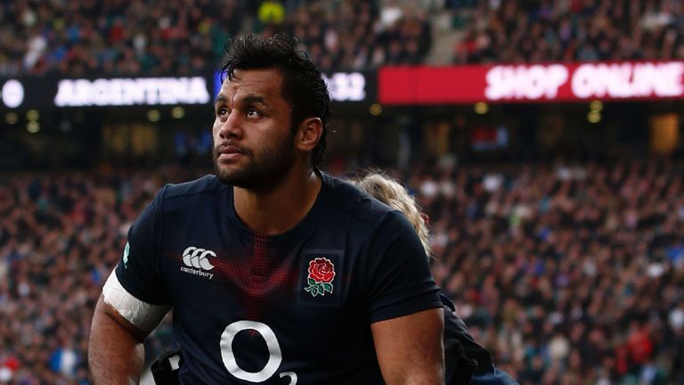 England's number 8 Billy Vunipola is helped from the field 