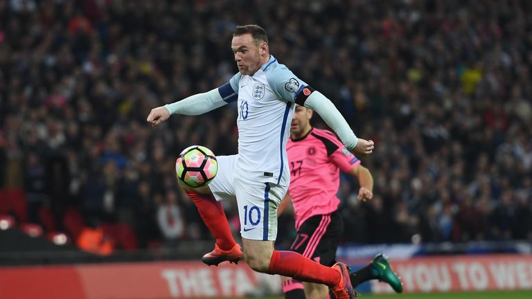 Wayne Rooney in action for England against Scotland