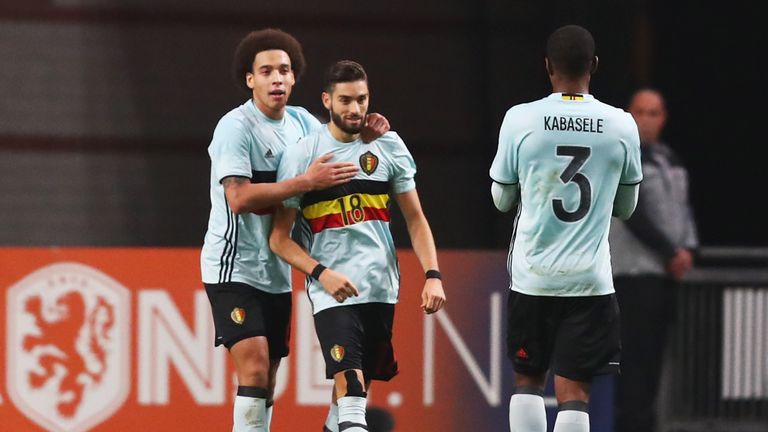 Yannick Carrasco of Belgium (18) celebrates with Axel Witsel and Christian Kabasele