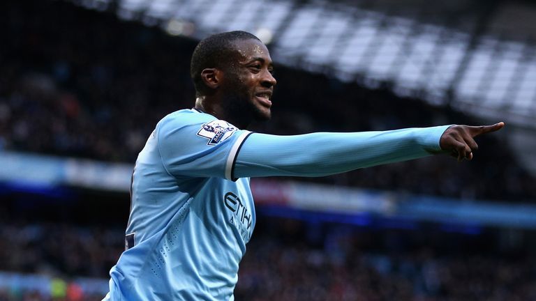 MANCHESTER, ENGLAND - FEBRUARY 22:  Yaya Toure of Manchester City celebrates scoring the opening goal during the Barclays Premier League match between Manc