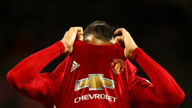 MANCHESTER, ENGLAND - NOVEMBER 27: Zlatan Ibrahimovic of Manchester United takes his shirt off after the final whistle during the Premier League match betw