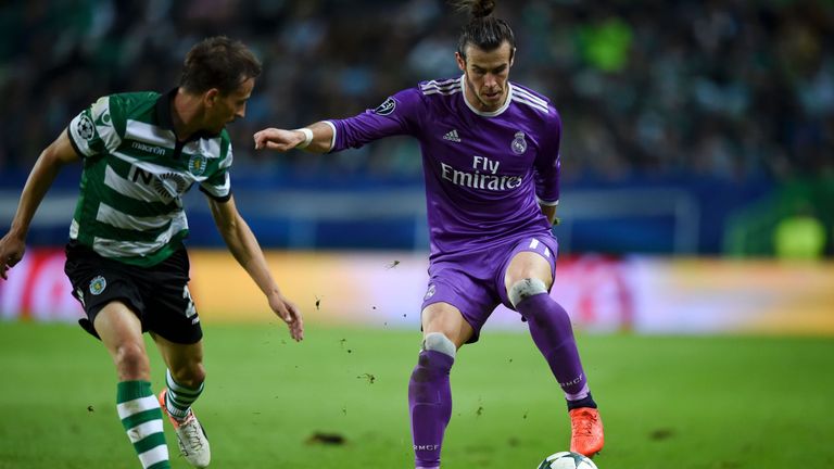 Gareth Bale takes on Joao Pereira