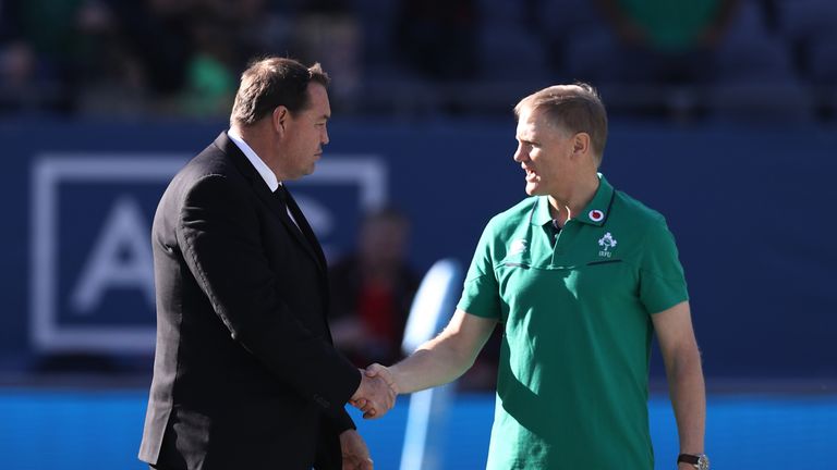 Opposing coaches Steve Hansen the head coach of New Zealand and Joe Schmidt the head coach of Ireland shake hands, Soldier Field, Chicago