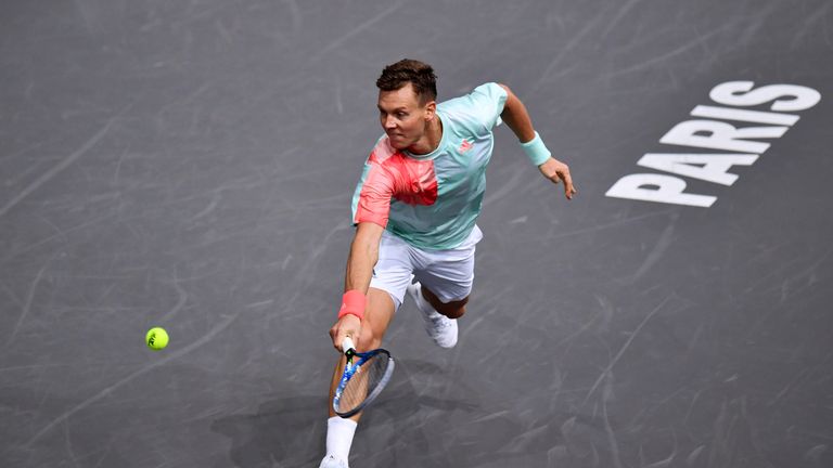 PARIS, FRANCE - NOVEMBER 01:  Tomas Berdych of the Czech Republic hits backhand during his men's singles second round match against Joao Sousa of Portugal 