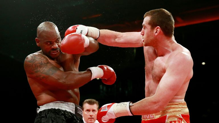 LIVERPOOL, ENGLAND - JULY 06:  David Price of England (R) in action with Tony Thompson of United States during their International Heavyweight Fight on Jul