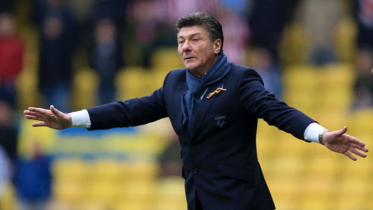 Watford manager Walter Mazzarri - wearing a rainbow laces badge - gestures on the touchline during the Premier League match v Stoke at Vicarage Road