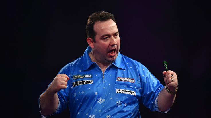 LONDON, ENGLAND - DECEMBER 20:  Brendan Dolan of Northern Ireland celebrates during the first round match against Christian Kist of the Netherlands on day 