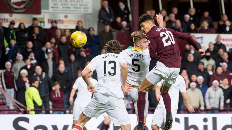 Bjorn Johnsen heads Hearts in front at Tynecastle