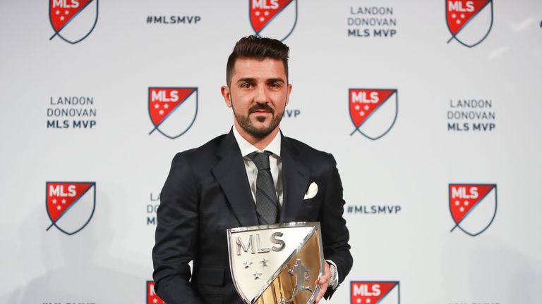 David Villa of New York City FC poses for a photo with the 2016 Landon Donovan MLS MVP trophy at Spring Studios, New York City