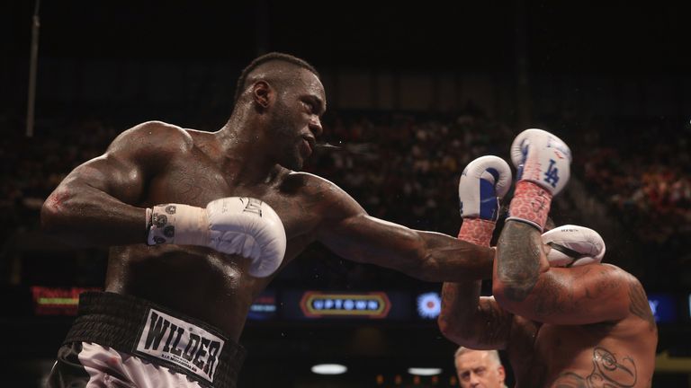 BIRMINGHAM, AL - JULY 16:  WBC World Heavyweight Champion Deontay Wilder (L) fights Chris Arreola (R) in a title defense at Legacy Arena at the BJCC on Jul