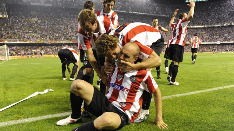 Athletic Bilbao forward Gaizka Toquero is congratulates by his teammates after scoring against Barcelona during the Copa del Rey final match in May 2009