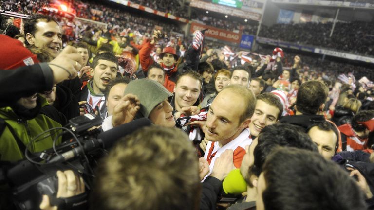 Supporters surround Athletic Bilbao's Gaizka Toquero during celebrations after winning  the Copa del Rey semi-final match against Sevilla