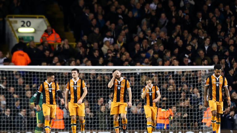 Hull's players look dejected after conceding in their 3-0 defeat at Tottenham