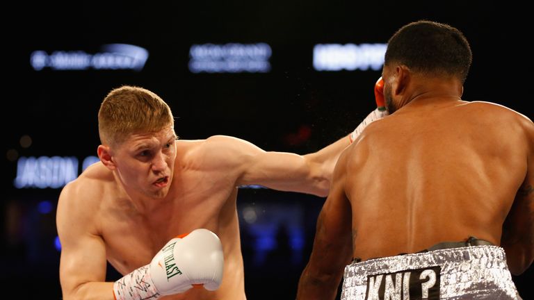 LAS VEGAS, NEVADA - MAY 07:  Jason Quigley throws a punch on  James De La Rosa during the middleweight fight at T-Mobile Arena on May 7, 2016 in Las Vegas,