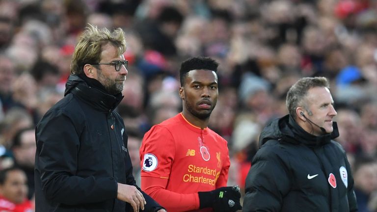 Daniel Sturridge (C) stands alongside Jurgen Klopp (L) as he waits to be substituted on to the pitch, Liverpool v Watford, 6 November