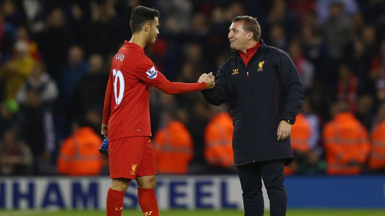 WEST BROMWICH, ENGLAND - SEPTEMBER 26 2012: Suso of Liverpool shakes hands with manager Brendan Rodgers after their Capital One Cup victory over West Brom