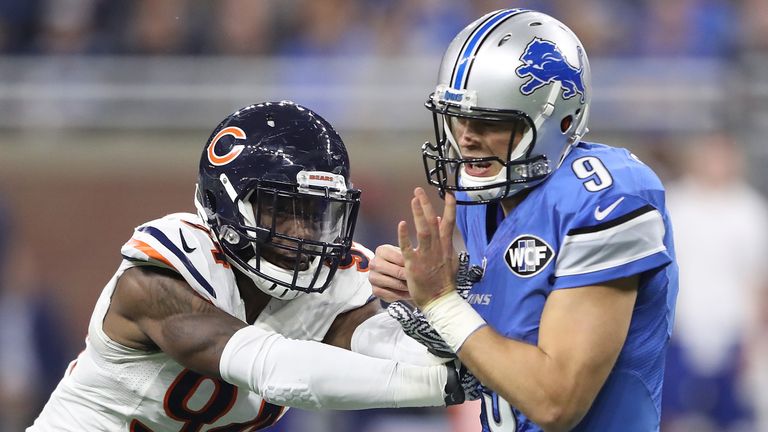 DETROIT, MI - DECEMBER 11: Quarterback Matthew Stafford #9 of the Detroit Lions is hit by Leonard Floyd #94 of the Chicago Bears during second quarter acti