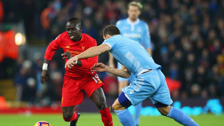 Sadio Mane of Liverpool takes on Erik Pieters of Stoke City during the Premier League match at Anfield