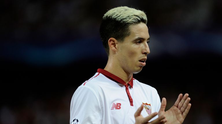 Sevilla's French forward Samir Nasri applauds during the UEFA Champions League Group H football match v Lyon