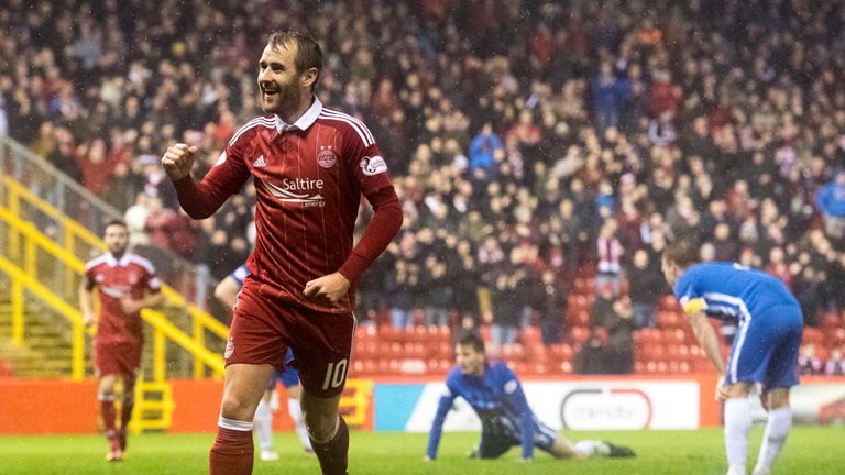 Aberdeen's Niall McGinn celebrates after scoring the fourth