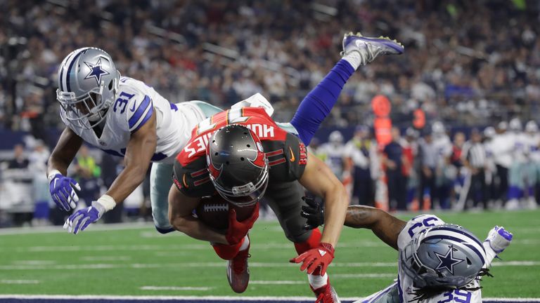 ARLINGTON, TX - DECEMBER 18:  Adam Humphries #11 of the Tampa Bay Buccaneers scores a touchdown on a deflected pass from Jameis Winston #3 during the third