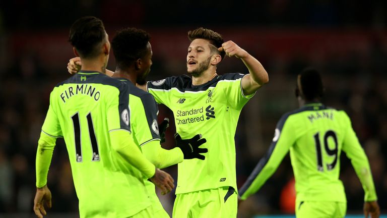 Adam Lallana celebrates after scoring for Liverpool against Middlesbrough
