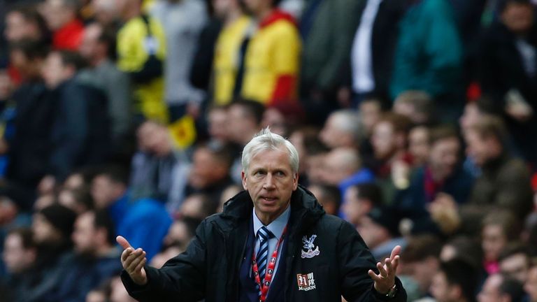 Crystal Palace's English manager Alan Pardew gestures to the Palace fans during an FA Cup semi-final football match between Crystal Palace and Watford at W