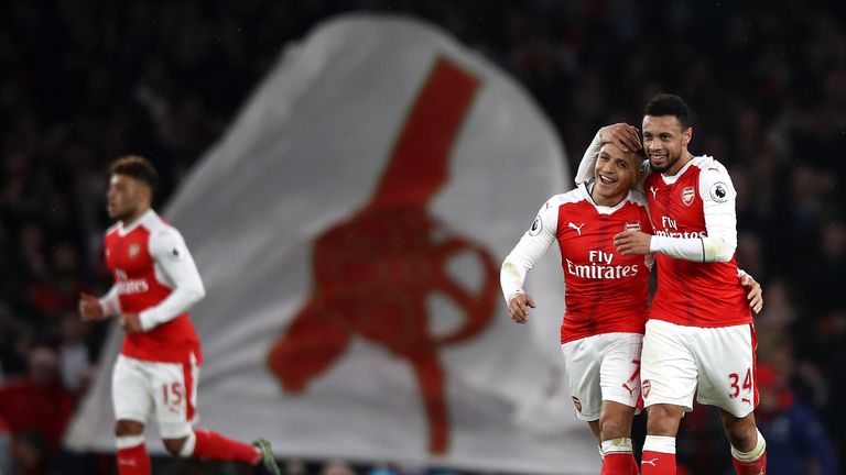 Alexis Sanchez of Arsenal (L) and Francis Coquelin of Arsenal (R) celebrate