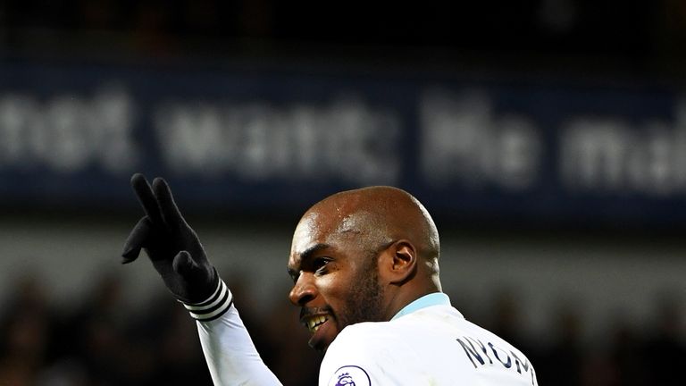 Allan Nyom holds up three fingers after West Brom's final goal in their 3-1 win over his old club Watford