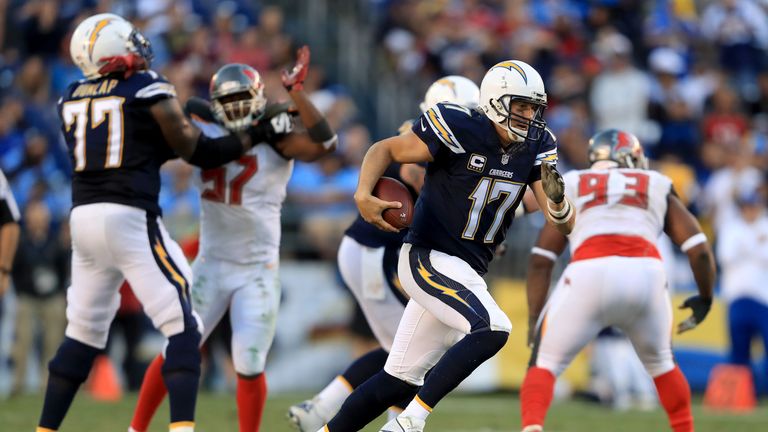 SAN DIEGO, CA - DECEMBER 04:  Philip Rivers #17 of the San Diego Chargers runs from the pocket during the second half of a game against the Tampa Bay Bucca