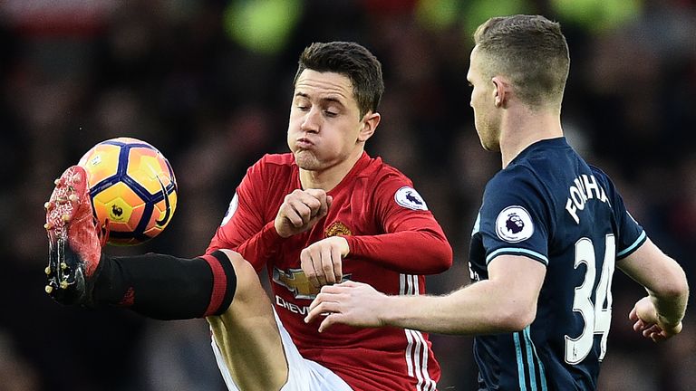 Ander Herrera vies for possession with Adam Forshaw