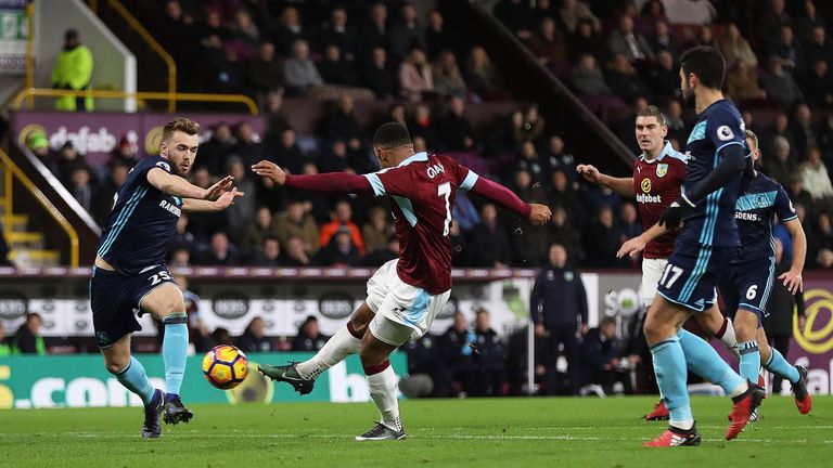 Andre Gray shoots on goal to give Burnley a 1-0 lead
