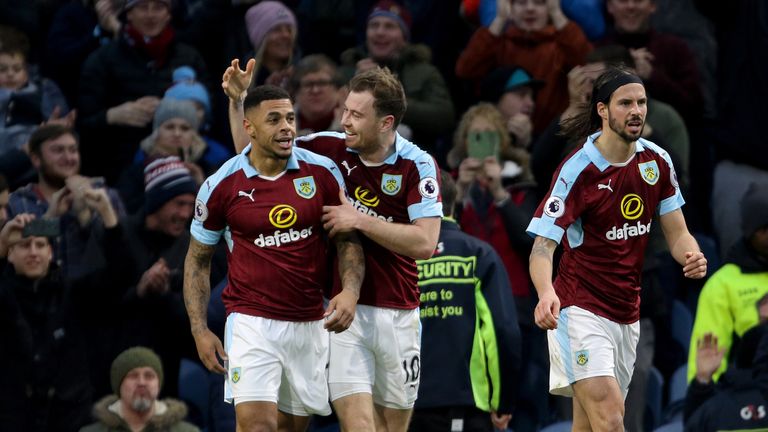Andre Gray (L) celebrates giving Burnley the lead