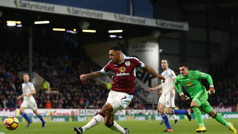 Andre Gray (C) scores his second goal of the game for Burnley