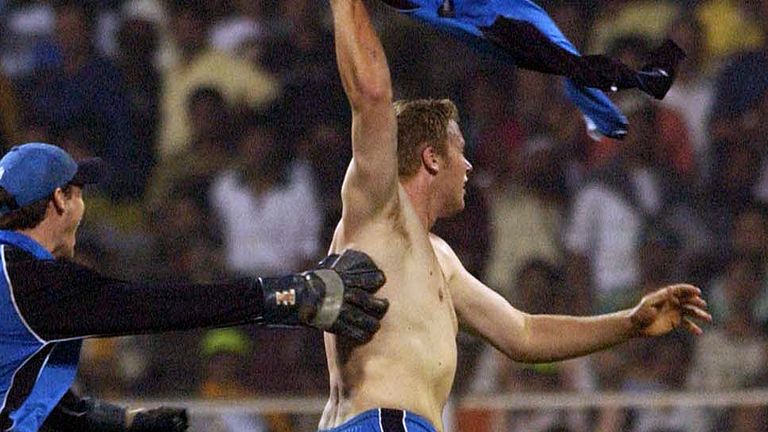 3 Feb 2002:  Andrew Flintoff of England celebrtaes with his shirt off after taking the final wicket during the India v England 6th One Day International ma