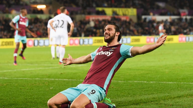 SWANSEA, WALES - DECEMBER 26:  Andy Carroll of West Ham United celebrates scoring his team's fourth goal during the Premier League match between Swansea Ci