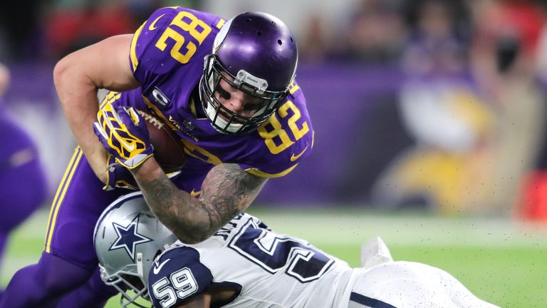 MINNEAPOLIS, MN - DECEMBER 1: Kyle Rudolph #82 of the Minnesota Vikings is tackled while carrying the ball by Anthony Hitchens #59 of the Dallas Cowboys in