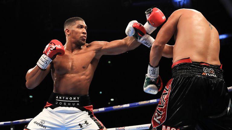 Anthony Joshua on the front foot against Eric Molina during their IBF World Heavyweight Championship bout