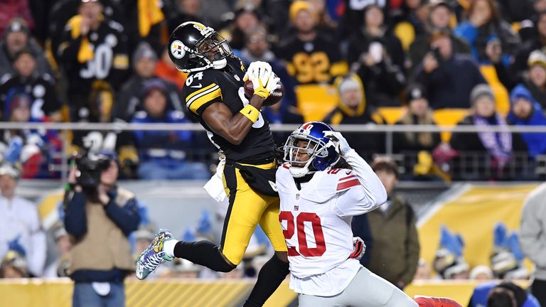 PITTSBURGH, PA - DECEMBER 04:  Antonio Brown #84 of the Pittsburgh Steelers makes a reception over Janoris Jenkins #20 of the New York Giants for a 22 yard